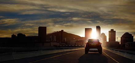 a car is going towards the city