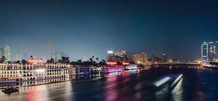 A waterfront city at night